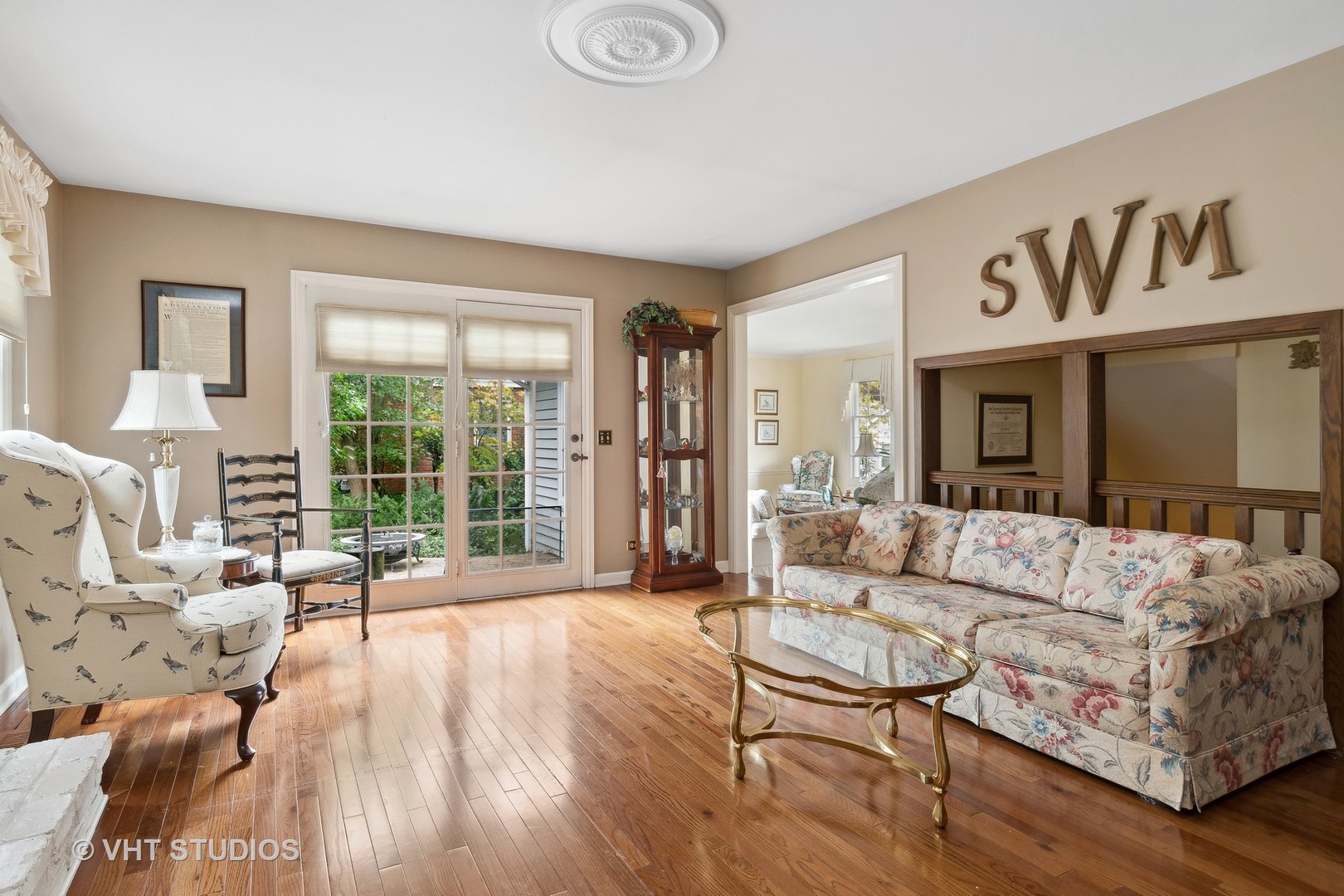 998 Landing Road Naperville, IL 60540 - Photo 10 of 18 a living room with furniture and a large window