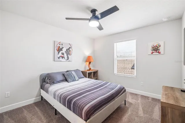 a view of a house with a yard and a garden