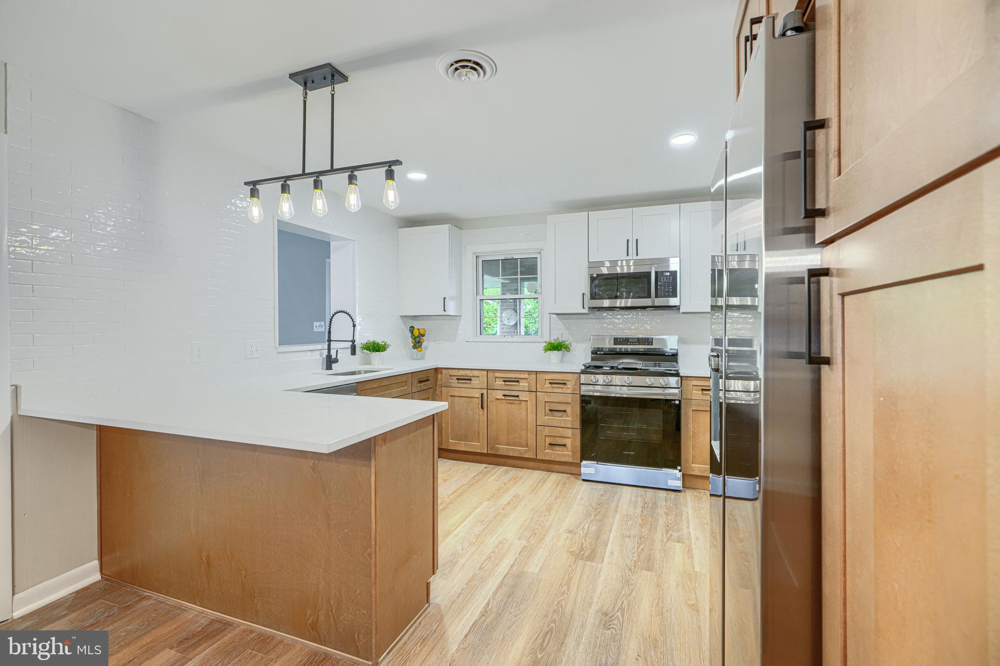 1237 South 48th Street Baltimore, MD 21222 - Photo 12 of 70 Renovated kitchen with new SS appliances