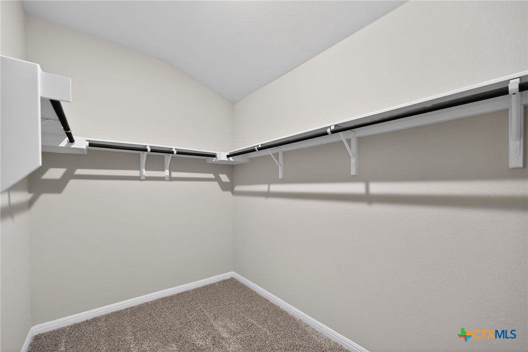 900 Main Street Hutto, TX 78634 - Photo 17 of 23 a view of small space with racks on the wall