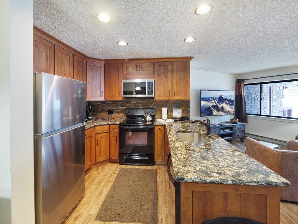405 4 O Clock Road, Unit 14B Breckenridge, CO 80424 - Photo 10 of 33 Kitchen