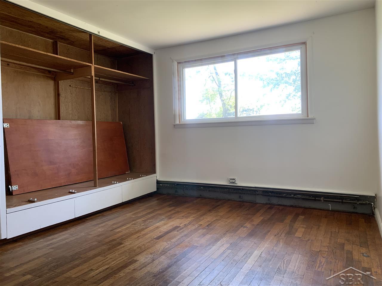6708 Muirhead Road Freeland, MI 48623 - Photo 8 of 29 First bedroom on main level.
