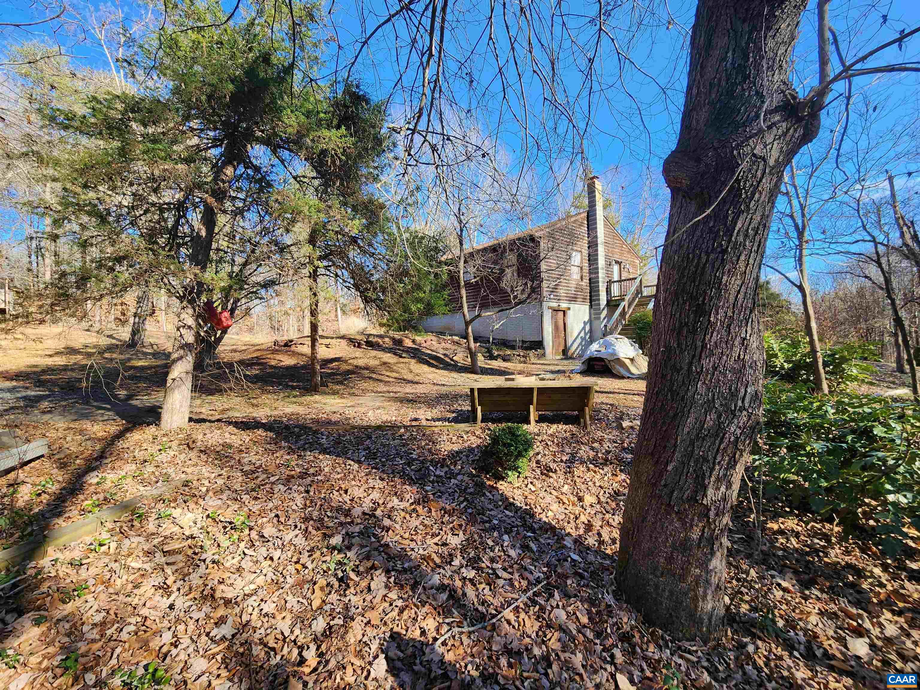 481 Rhodes School Lane Palmyra, VA 22963 - Photo 15 of 34 a backyard of a house with lots of green space
