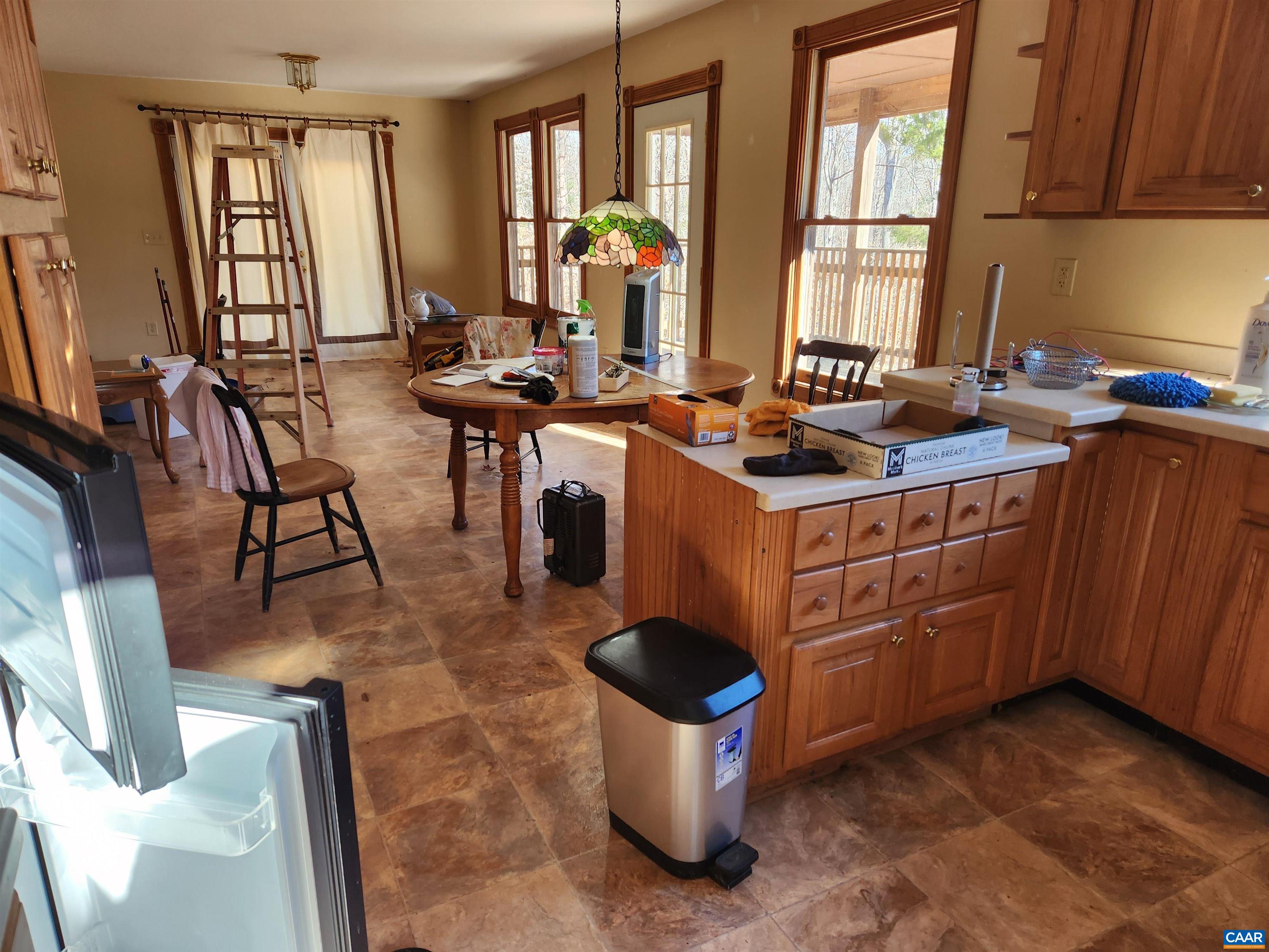 481 Rhodes School Lane Palmyra, VA 22963 - Photo 22 of 34 a kitchen with a stove a sink and cabinets