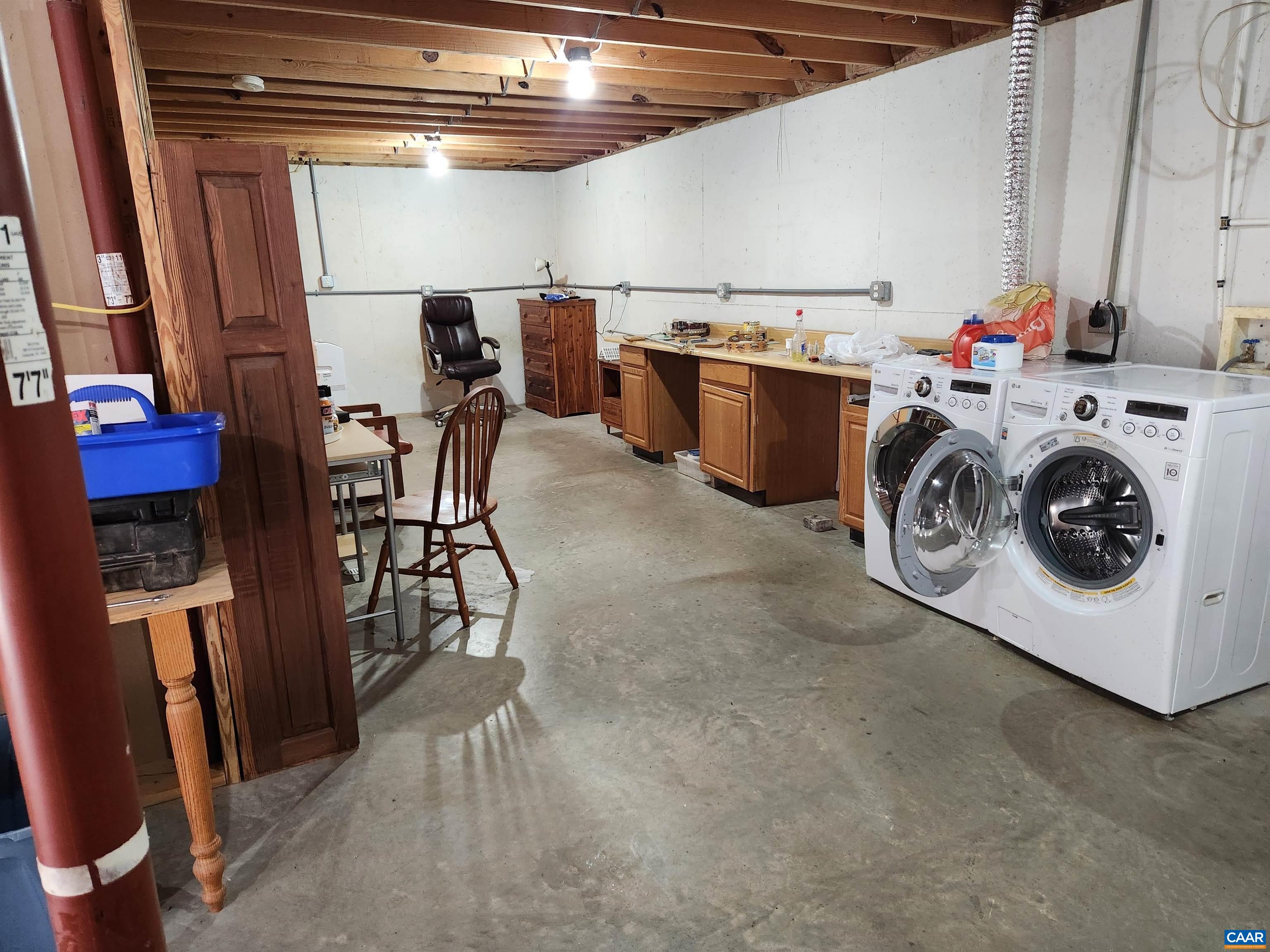 481 Rhodes School Lane Palmyra, VA 22963 - Photo 30 of 34 a utility room with dryer and washer