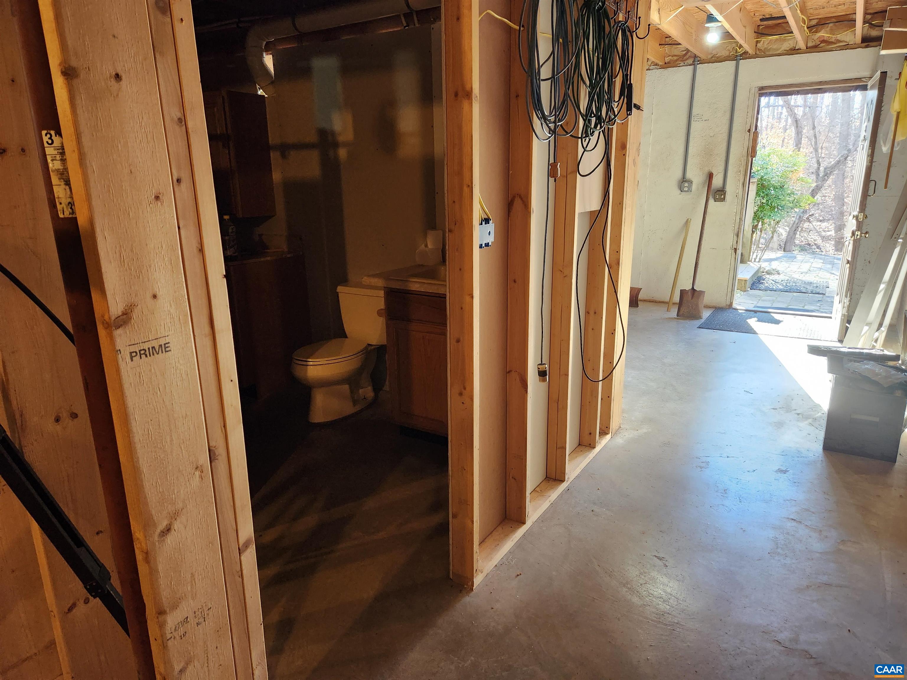 481 Rhodes School Lane Palmyra, VA 22963 - Photo 34 of 34 a view of a hallway with wooden floor and windows
