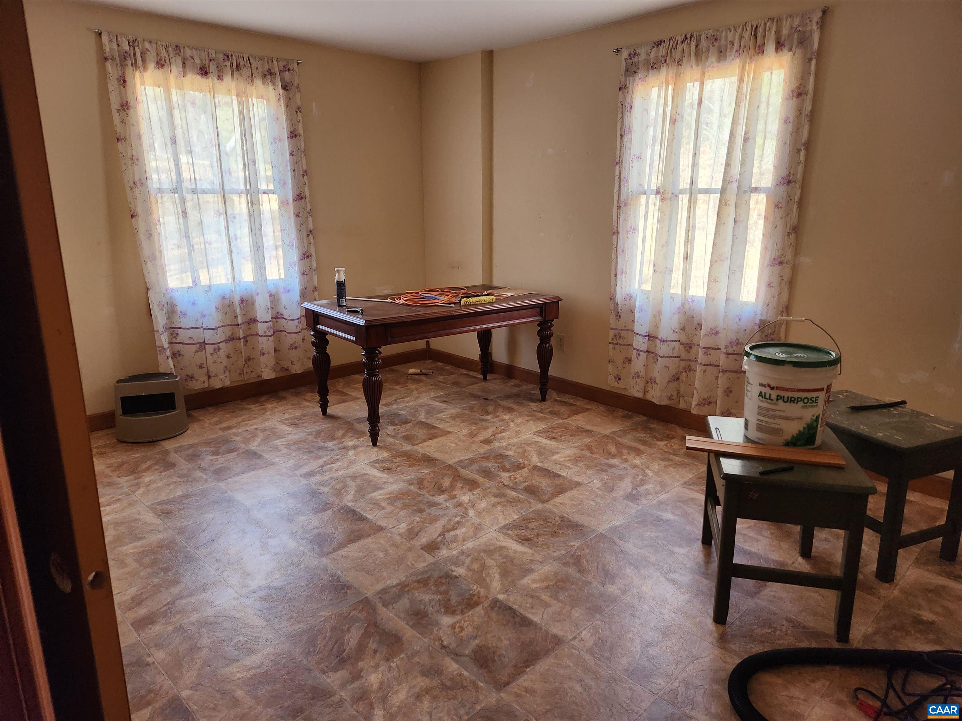 481 Rhodes School Lane Palmyra, VA 22963 - Photo 5 of 34 a living room with furniture and a window