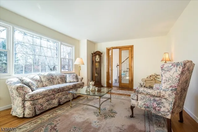 a kitchen with granite countertop a sink cabinets and window