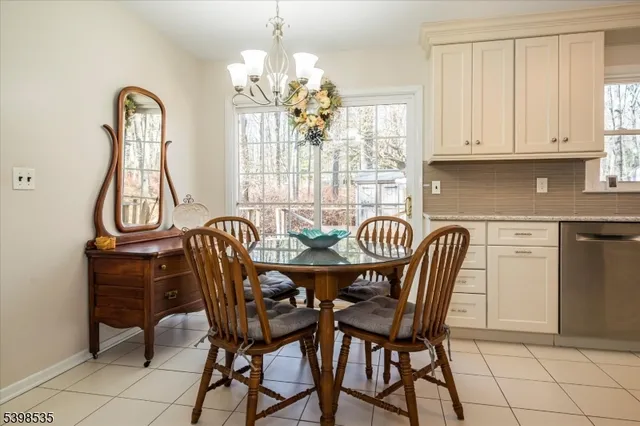 a bathroom with a sink mirror toilet and bathtub