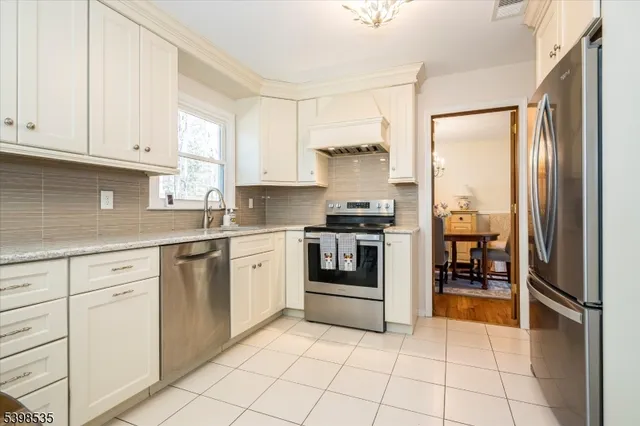 a bedroom with a bed and a table in it