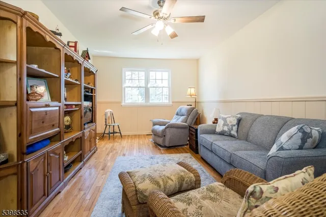 a bedroom with a bed and a chair