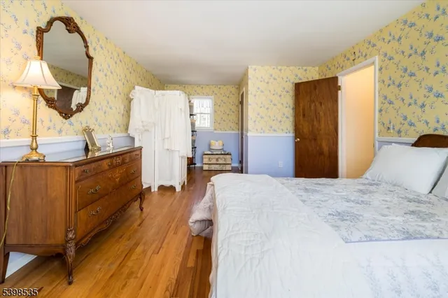 a backyard of a house with yard and outdoor seating