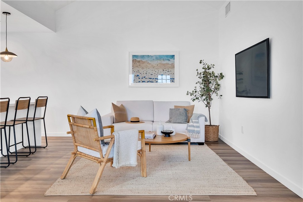 226 A Arena Street El Segundo, CA 90245 - Photo 22 of 47 a living room with furniture and a rug