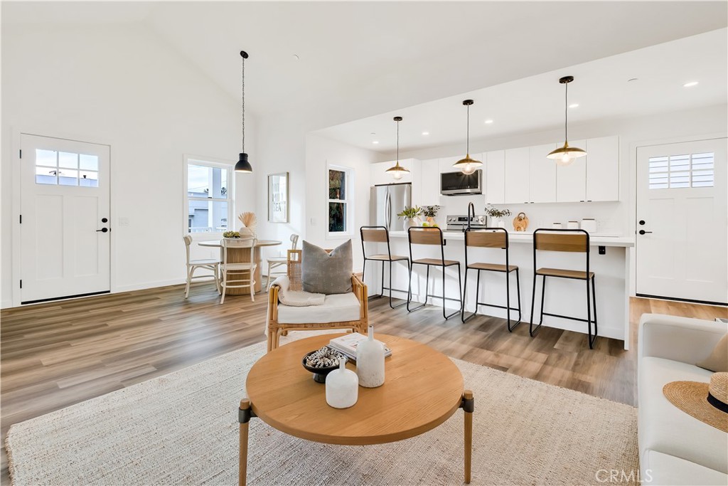 226 A Arena Street El Segundo, CA 90245 - Photo 32 of 47 a living room with furniture and a wooden floor