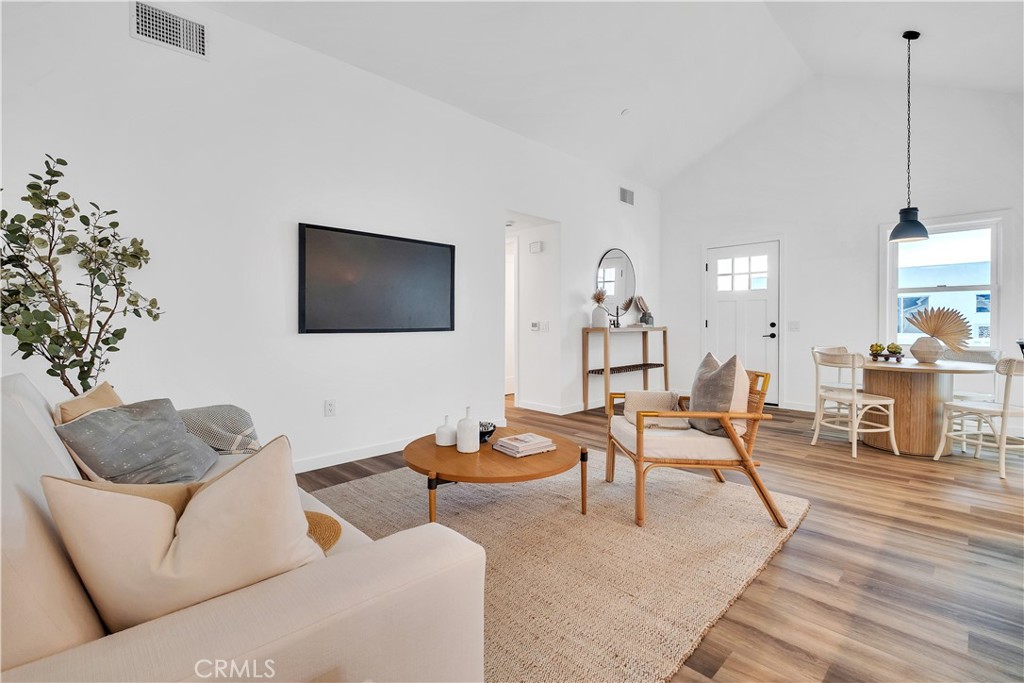 226 A Arena Street El Segundo, CA 90245 - Photo 33 of 47 a living room with furniture and wooden floor