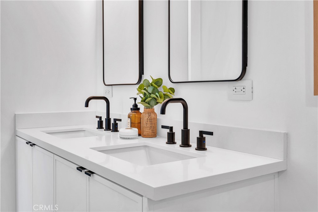 226 A Arena Street El Segundo, CA 90245 - Photo 44 of 47 a bathroom with a sink and a mirror