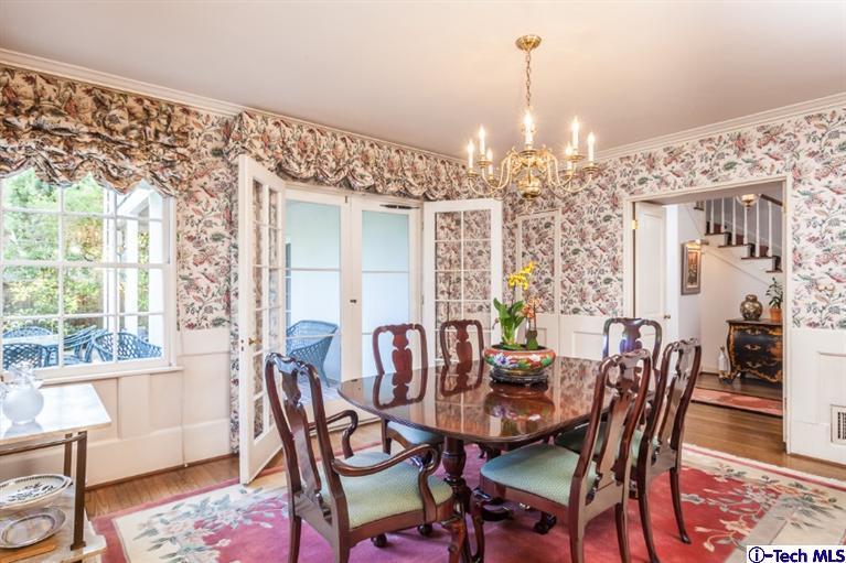 520 Bellmore Way Pasadena, CA 91103 - Photo 11 of 31 a view of a dining room with furniture window and wooden floor