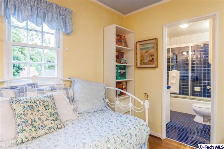 520 Bellmore Way Pasadena, CA 91103 - Photo 23 of 31 a living room with furniture and a large window