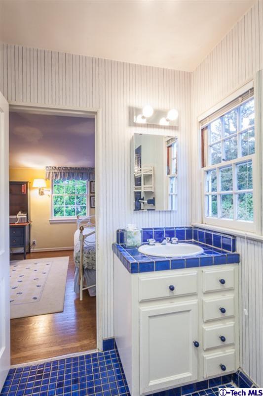 520 Bellmore Way Pasadena, CA 91103 - Photo 24 of 31 a kitchen with granite countertop a sink and cabinets