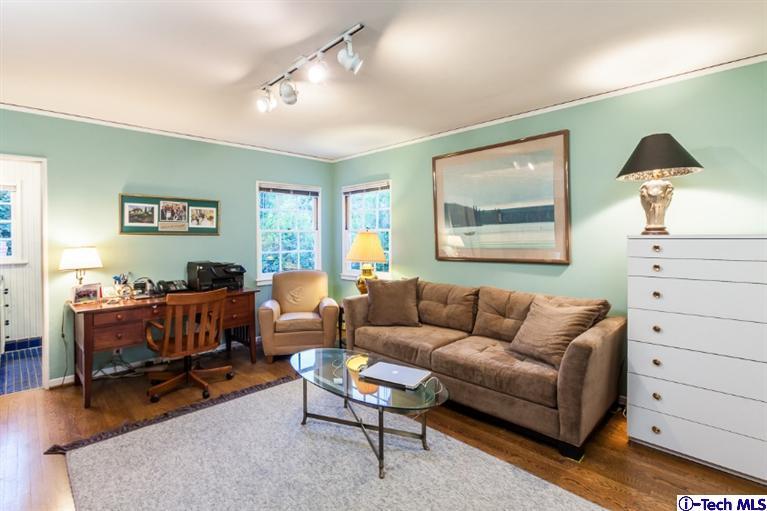 520 Bellmore Way Pasadena, CA 91103 - Photo 25 of 31 a living room with furniture and a dresser