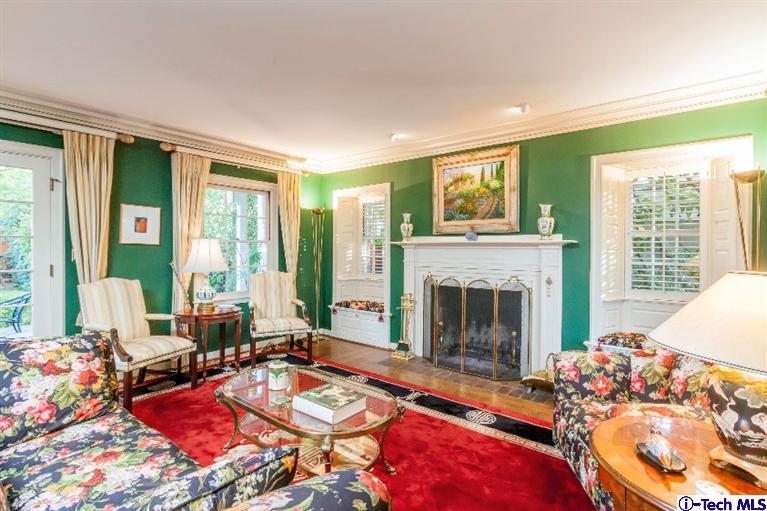 520 Bellmore Way Pasadena, CA 91103 - Photo 7 of 31 a living room with furniture fireplace and floor to ceiling windows