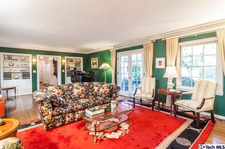 520 Bellmore Way Pasadena, CA 91103 - Photo 8 of 31 a living room filled with furniture hardwood floor and a table