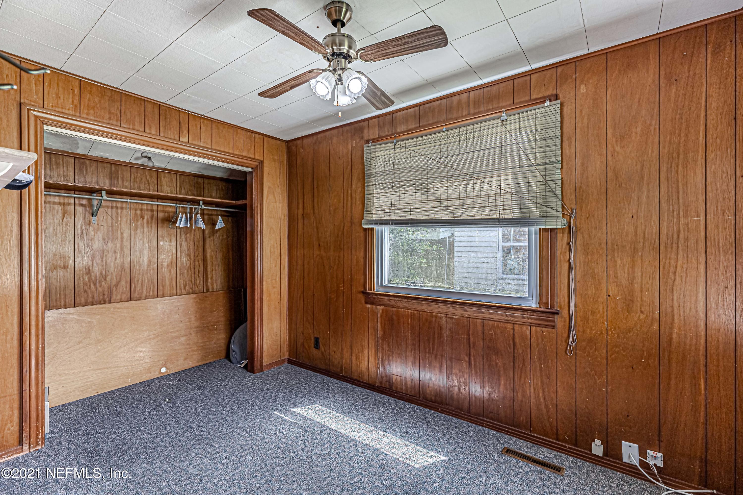 4627 Birkenhead Road Jacksonville, FL 32210 - Photo 18 of 30 an empty room with windows