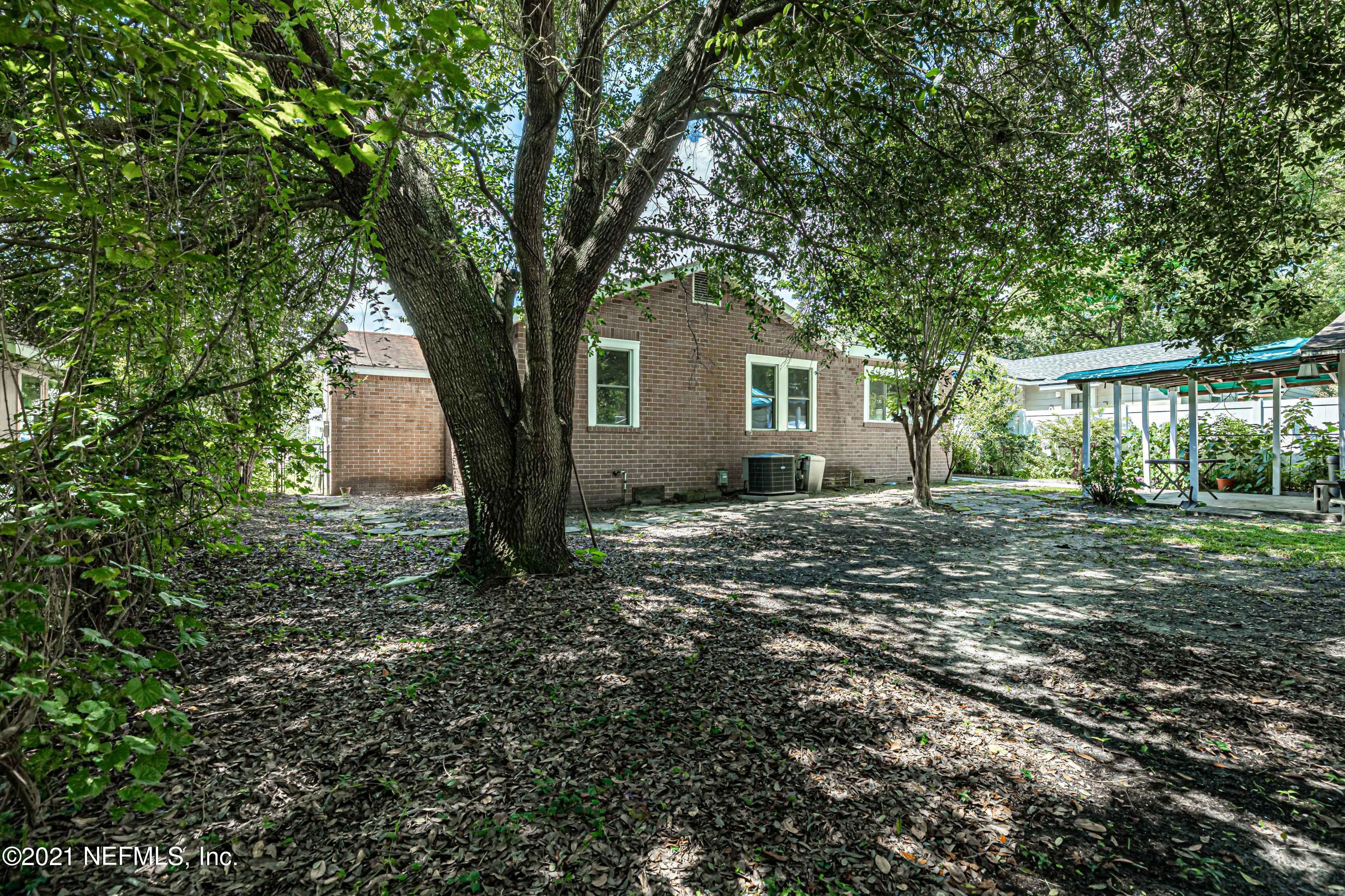 4627 Birkenhead Road Jacksonville, FL 32210 - Photo 25 of 30 a house that has a tree in front of a house
