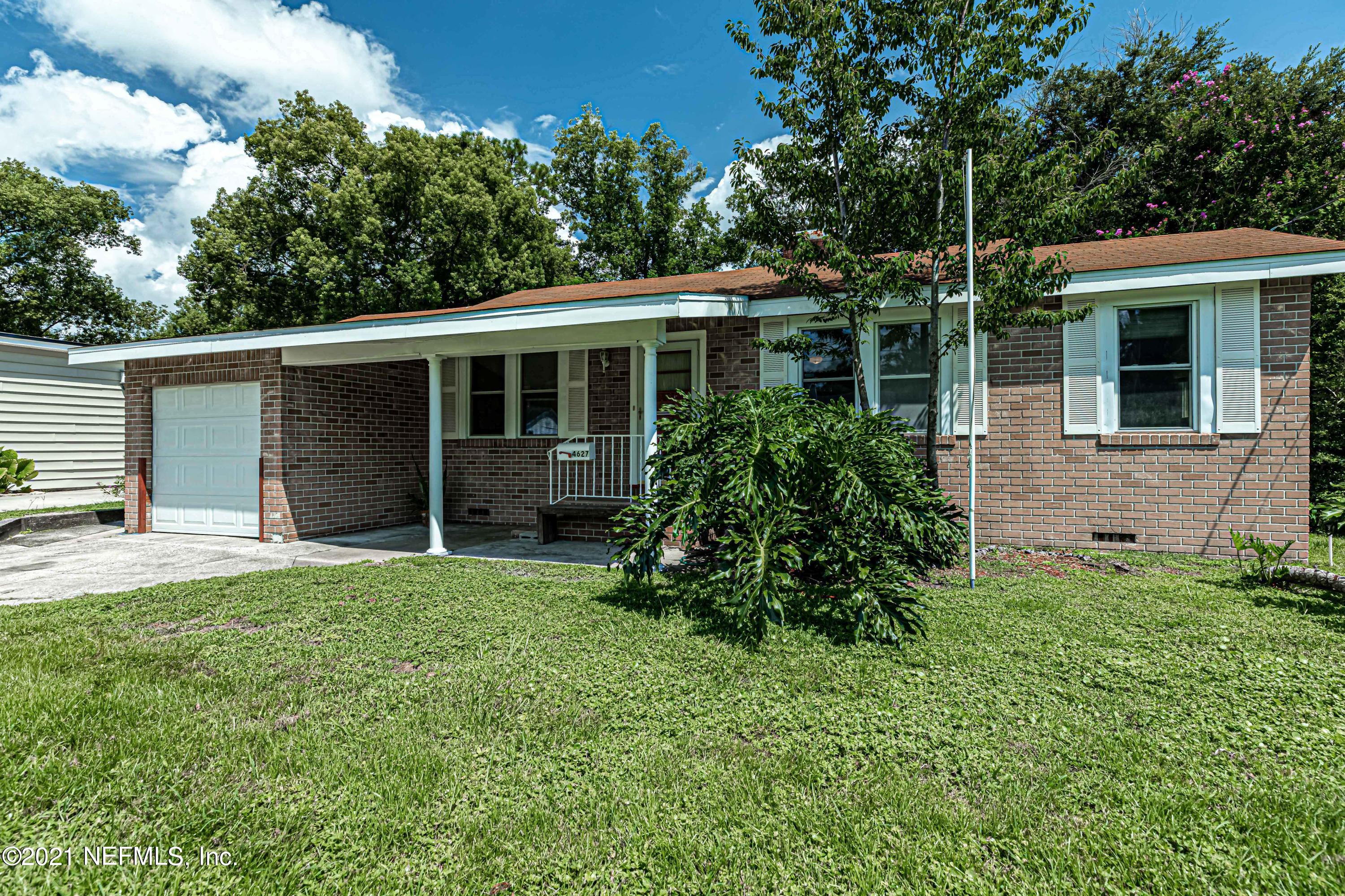 4627 Birkenhead Road Jacksonville, FL 32210 - Photo 30 of 30 front view of a house with a yard