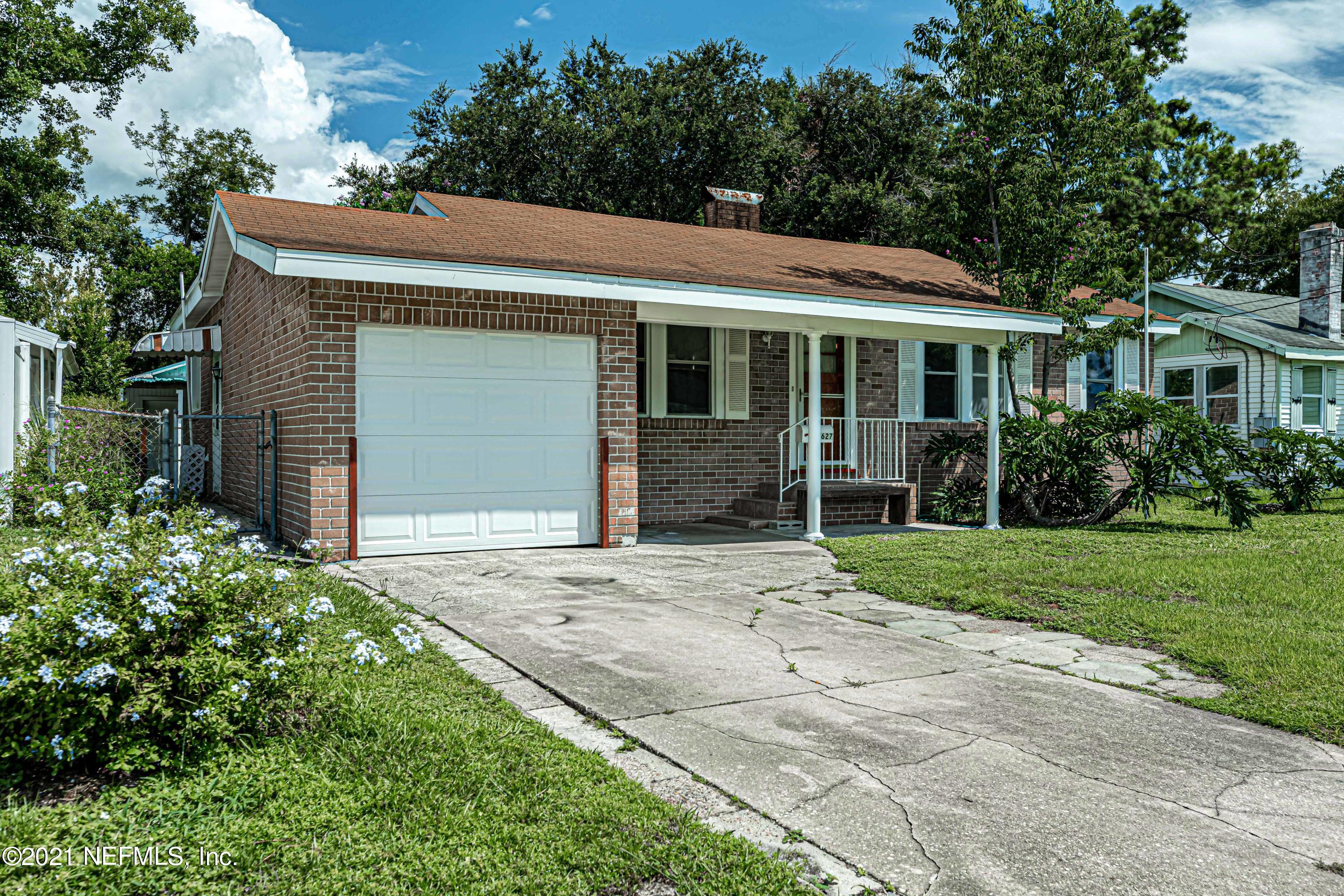 4627 Birkenhead Road Jacksonville, FL 32210 - Photo 3 of 30 front view of house with a yard