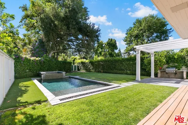 swimming pool with outdoor seating
