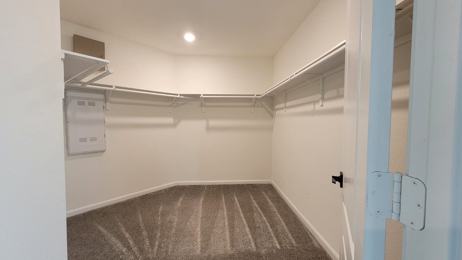 5704 Bluebonnet Lane Rosenberg, TX 77469 - Photo 13 of 34 a view of a room with racks on the wall