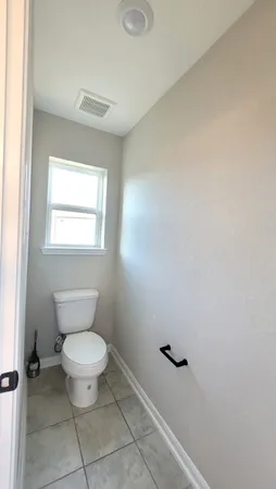 a bathroom with a toilet