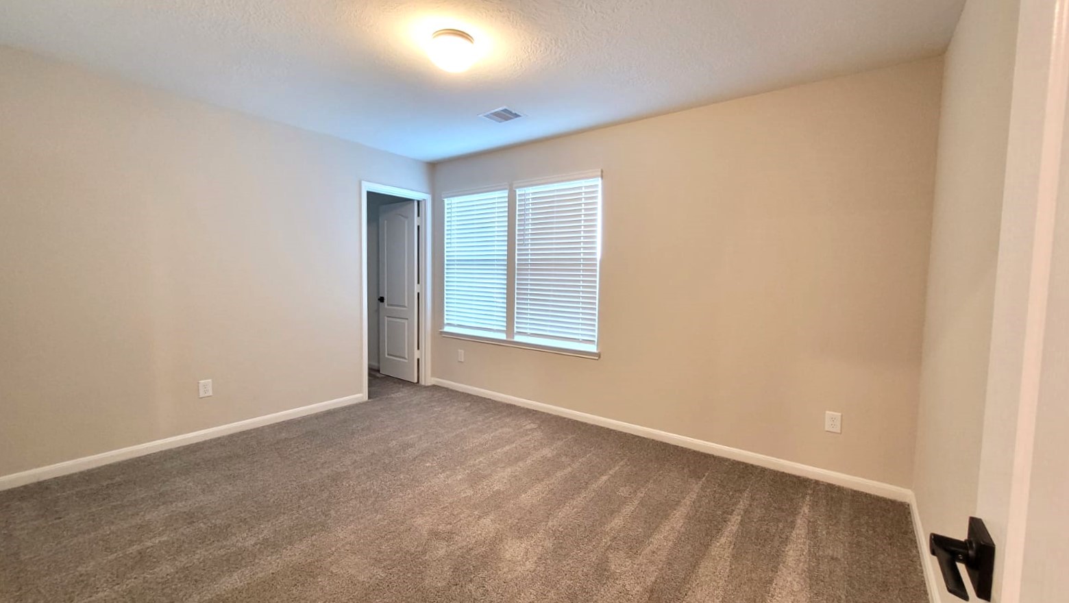 5704 Bluebonnet Lane Rosenberg, TX 77469 - Photo 25 of 34 an empty room with windows