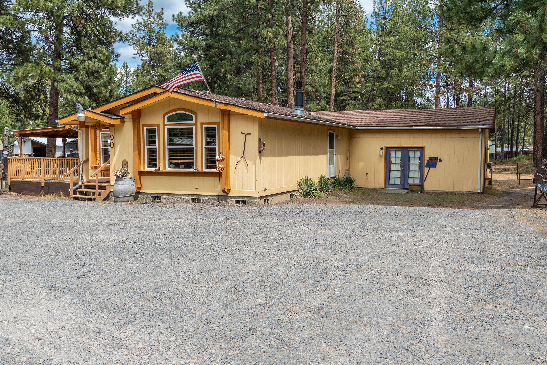 59988 Navajo Road Bend, OR 97702 - Photo 9 of 39 Studio entrance to the right & separate parking/RV parking area