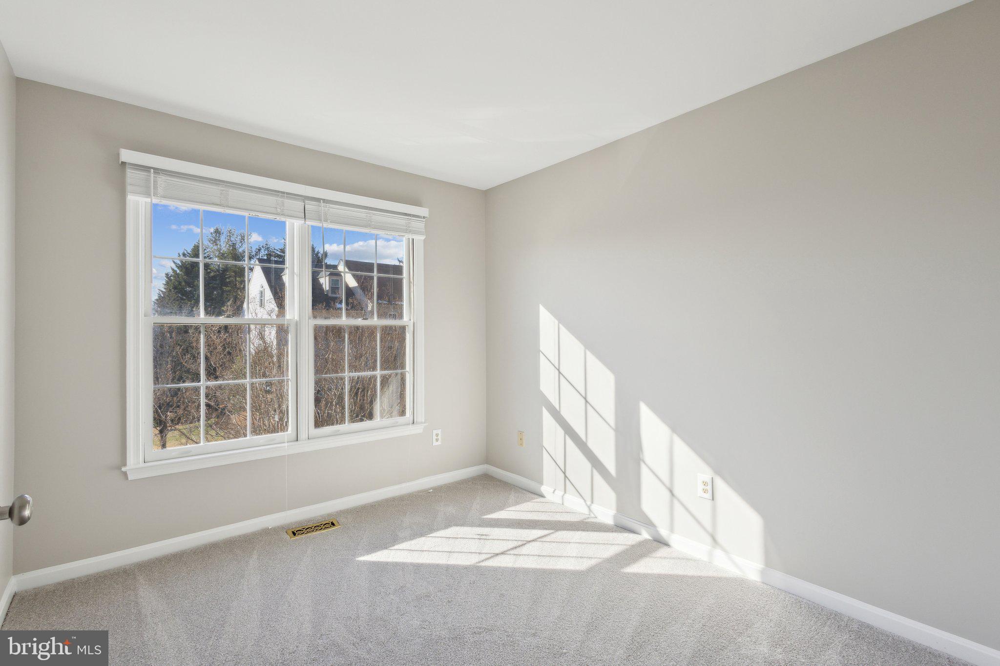 8802 Eagle Rock Lane Springfield, VA 22153 - Photo 13 of 18 a view of an empty room with a window