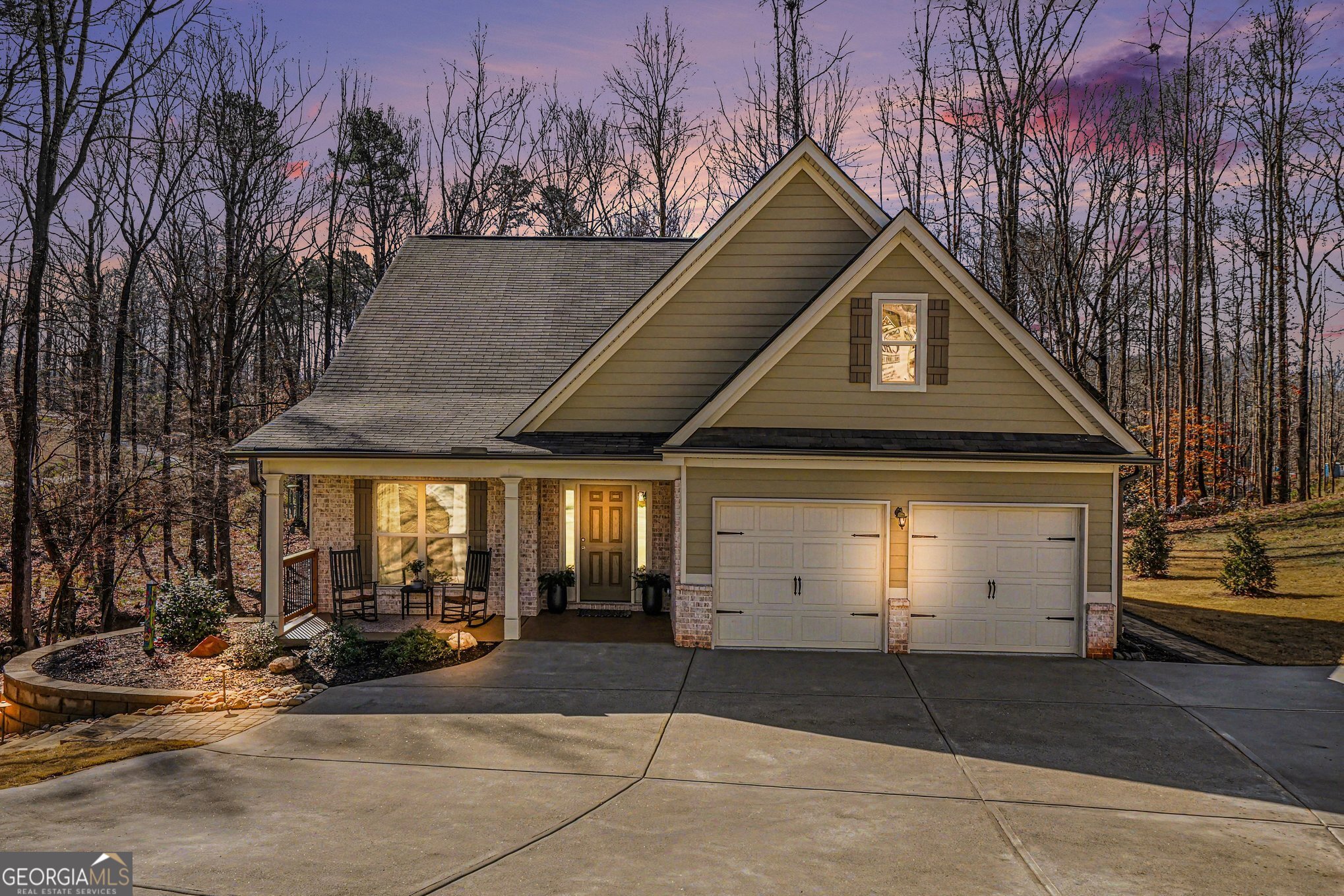 994 Lakeview Drive Commerce, GA 30529 - Photo 2 of 42 a front view of a house with garage