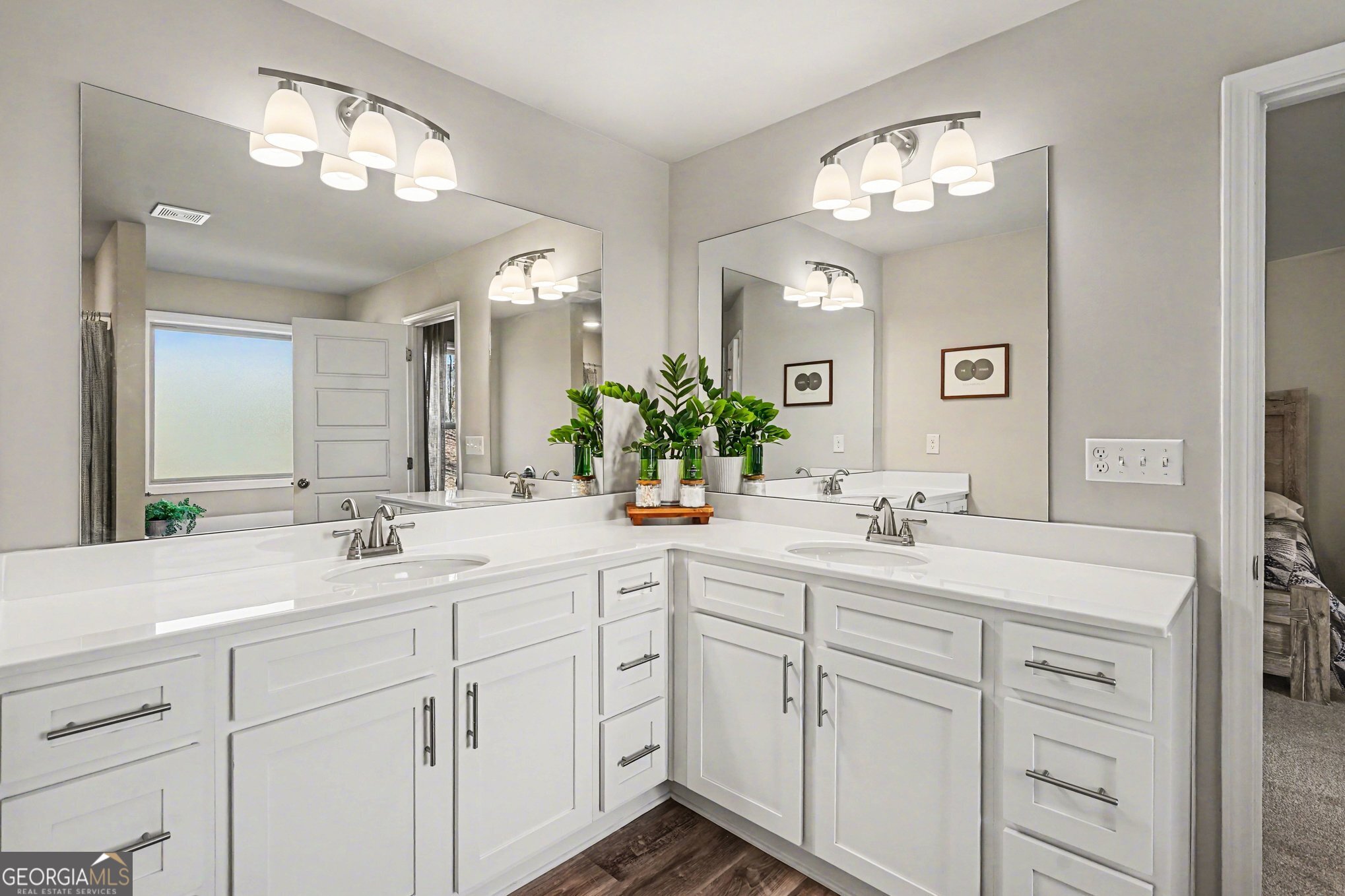 994 Lakeview Drive Commerce, GA 30529 - Photo 21 of 42 a bathroom with double sink and a mirror