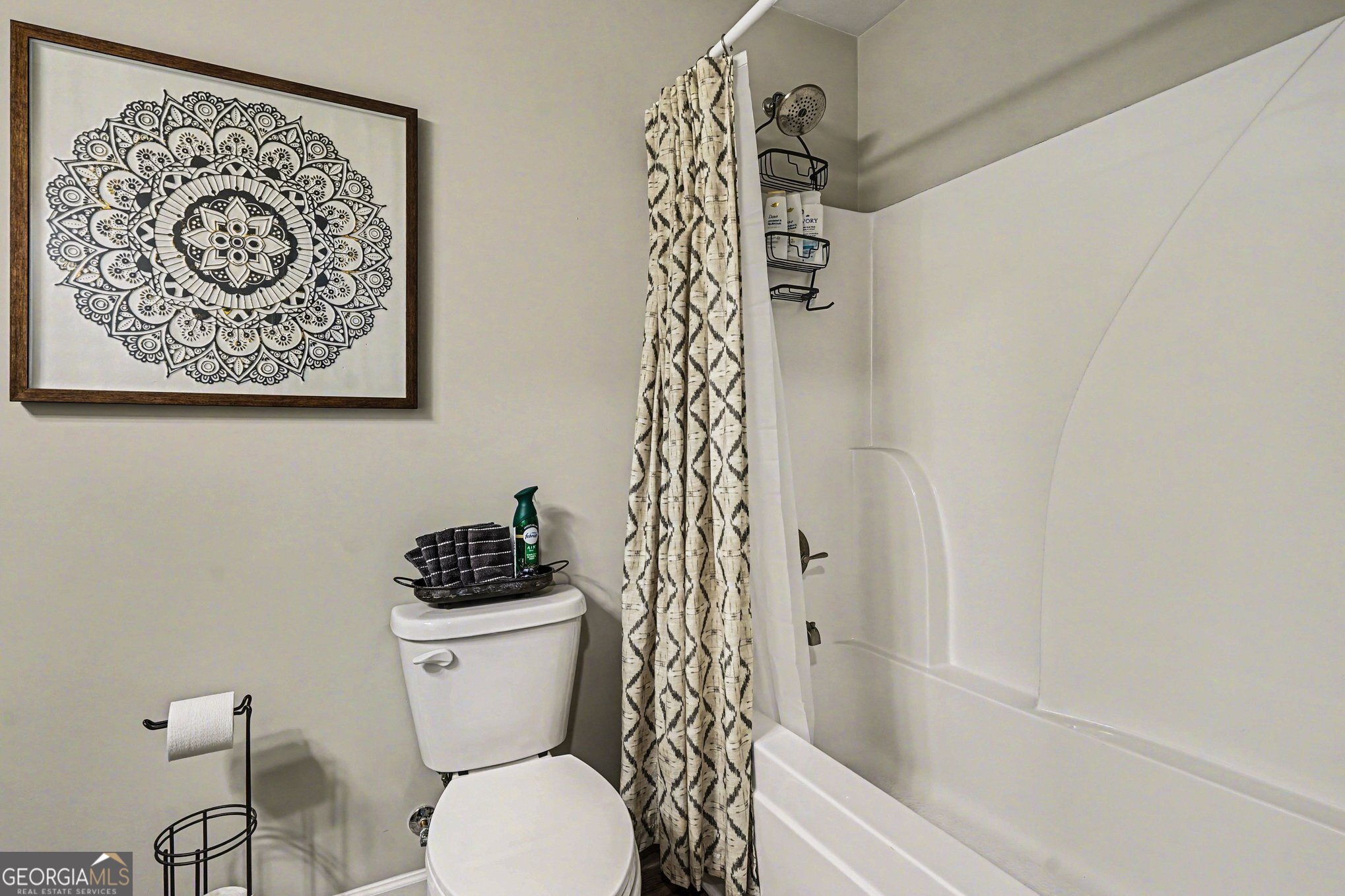 994 Lakeview Drive Commerce, GA 30529 - Photo 30 of 42 a bathroom with a toilet and a shower curtain