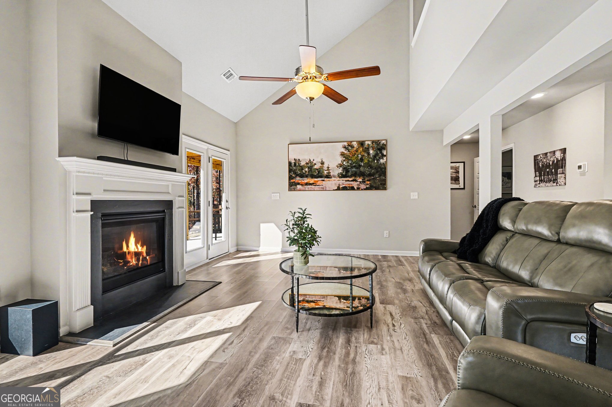 994 Lakeview Drive Commerce, GA 30529 - Photo 6 of 42 a living room with furniture and a fireplace