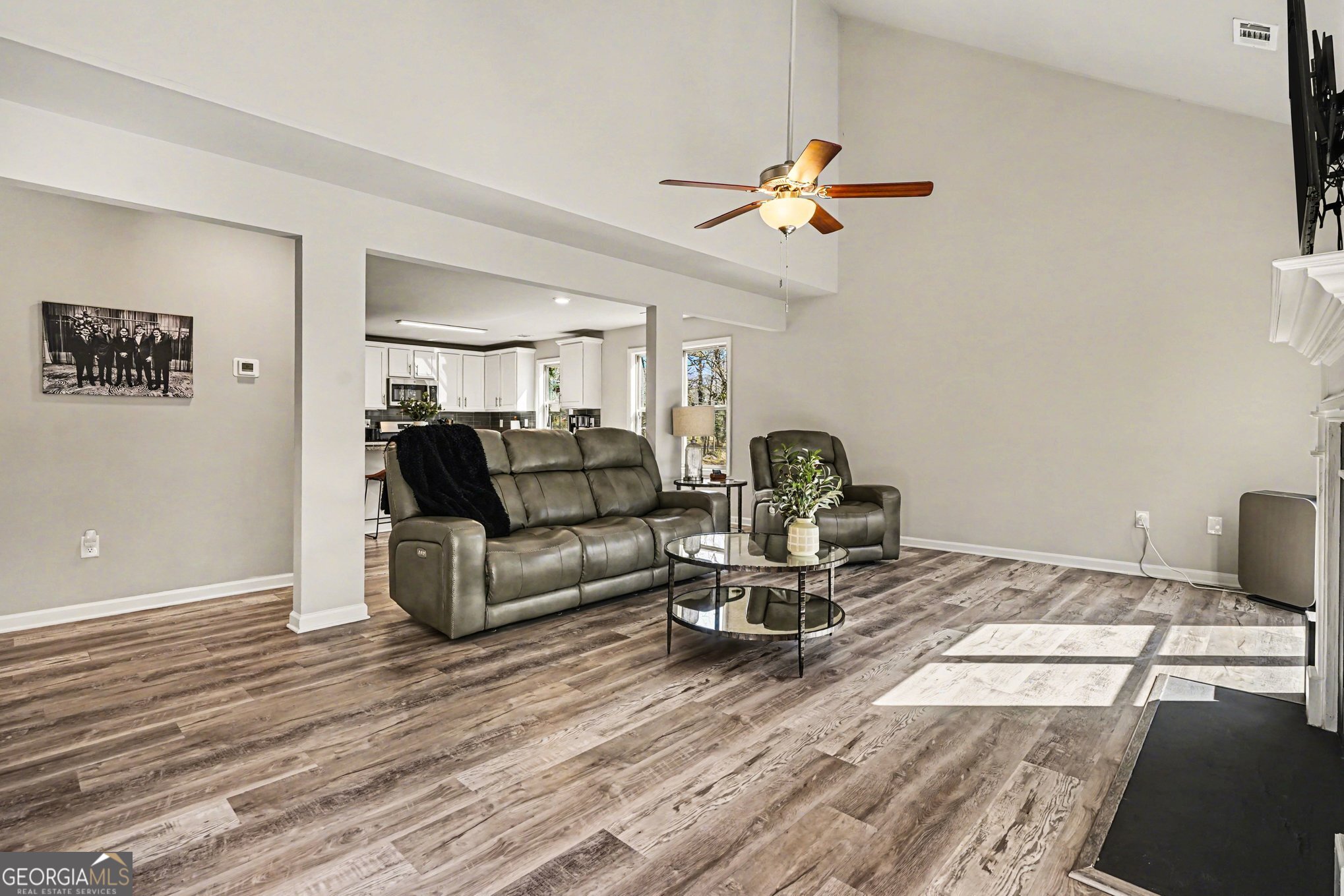 994 Lakeview Drive Commerce, GA 30529 - Photo 8 of 42 a living room with furniture and a wooden floor