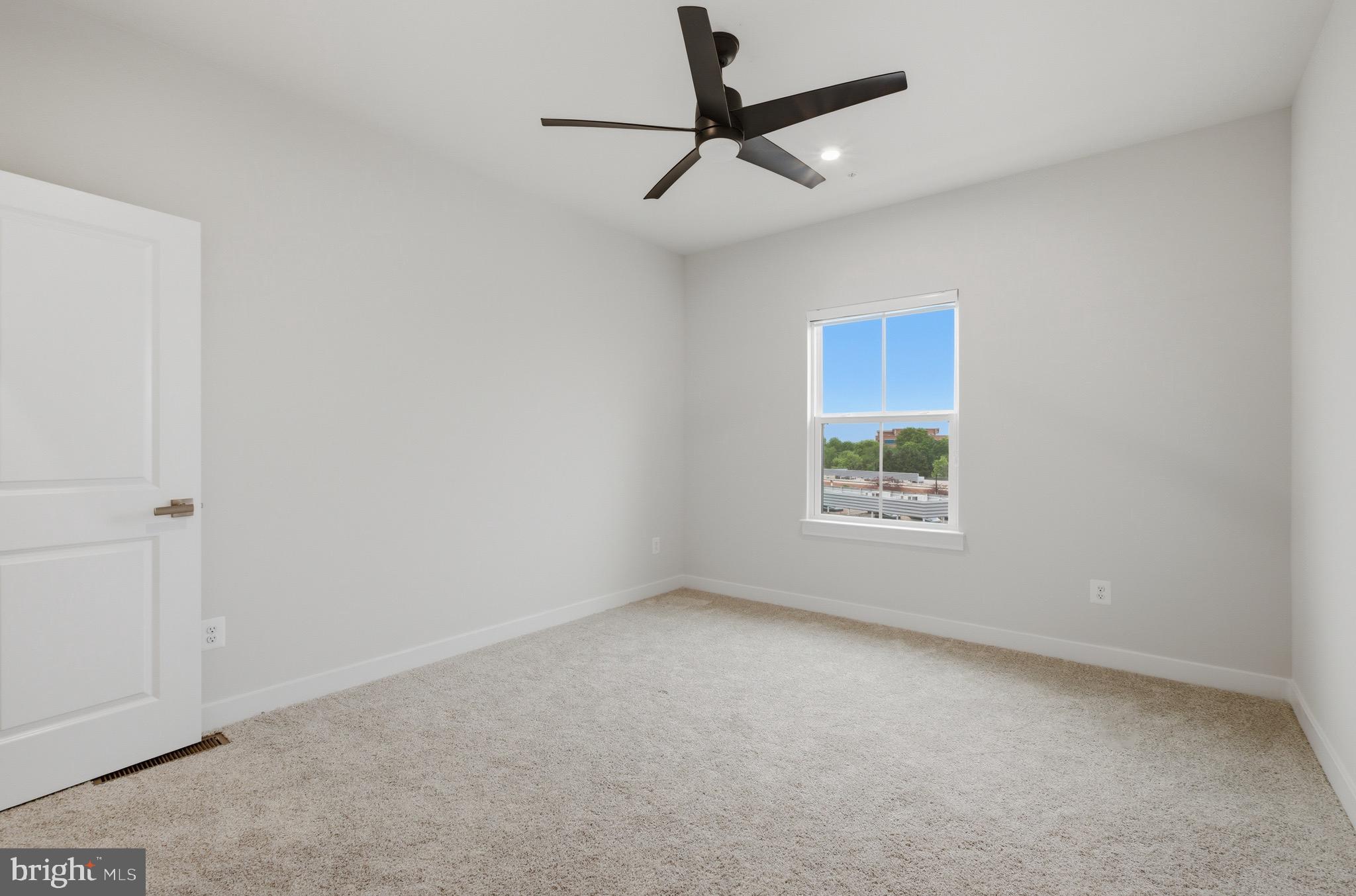 14421 Albemarle Point Place Chantilly, VA 20151 - Photo 23 of 25 a view of room with a ceiling fan and window