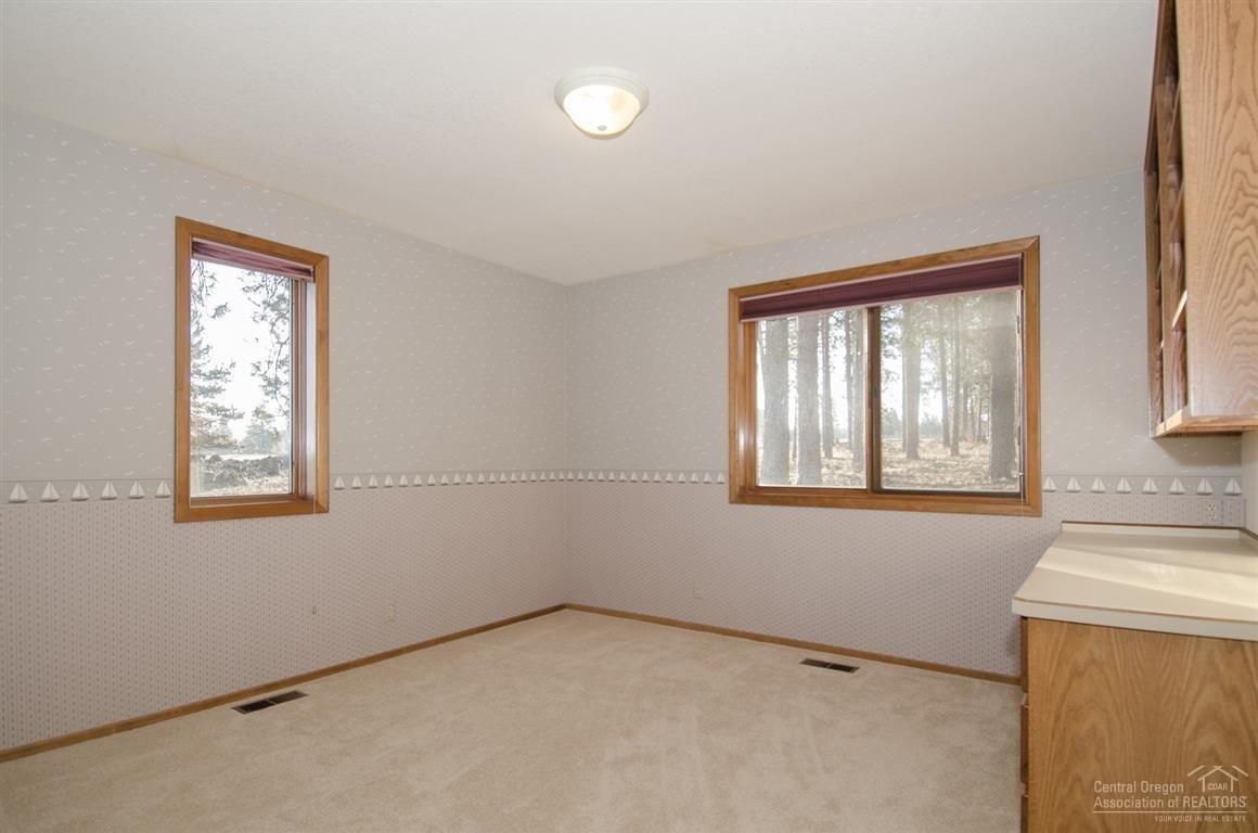 20903 Knott Road Bend, OR 97702 - Photo 18 of 23 an empty room with windows
