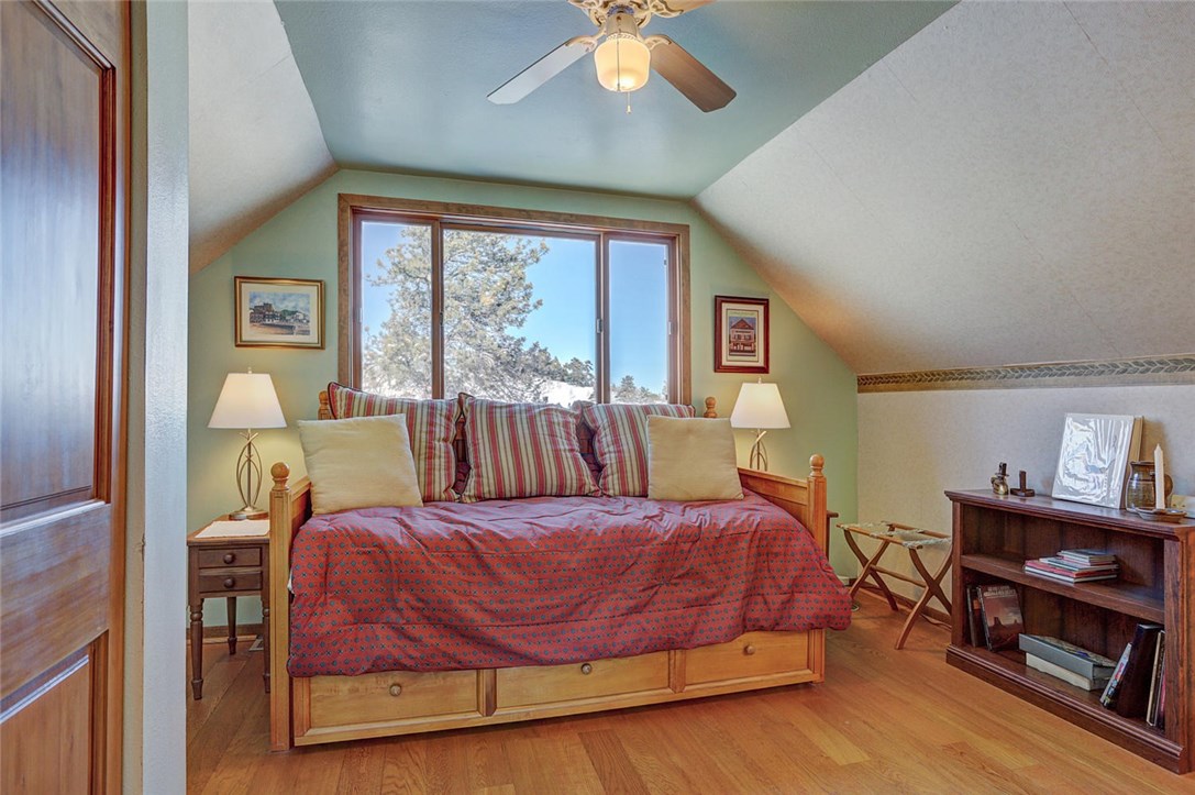4283 Buffalo Ridge Road Como, CO 80432 - Photo 21 of 35 Guest bedroom upstairs - Stunning Views, spacious with a day bed and trundle bed below.