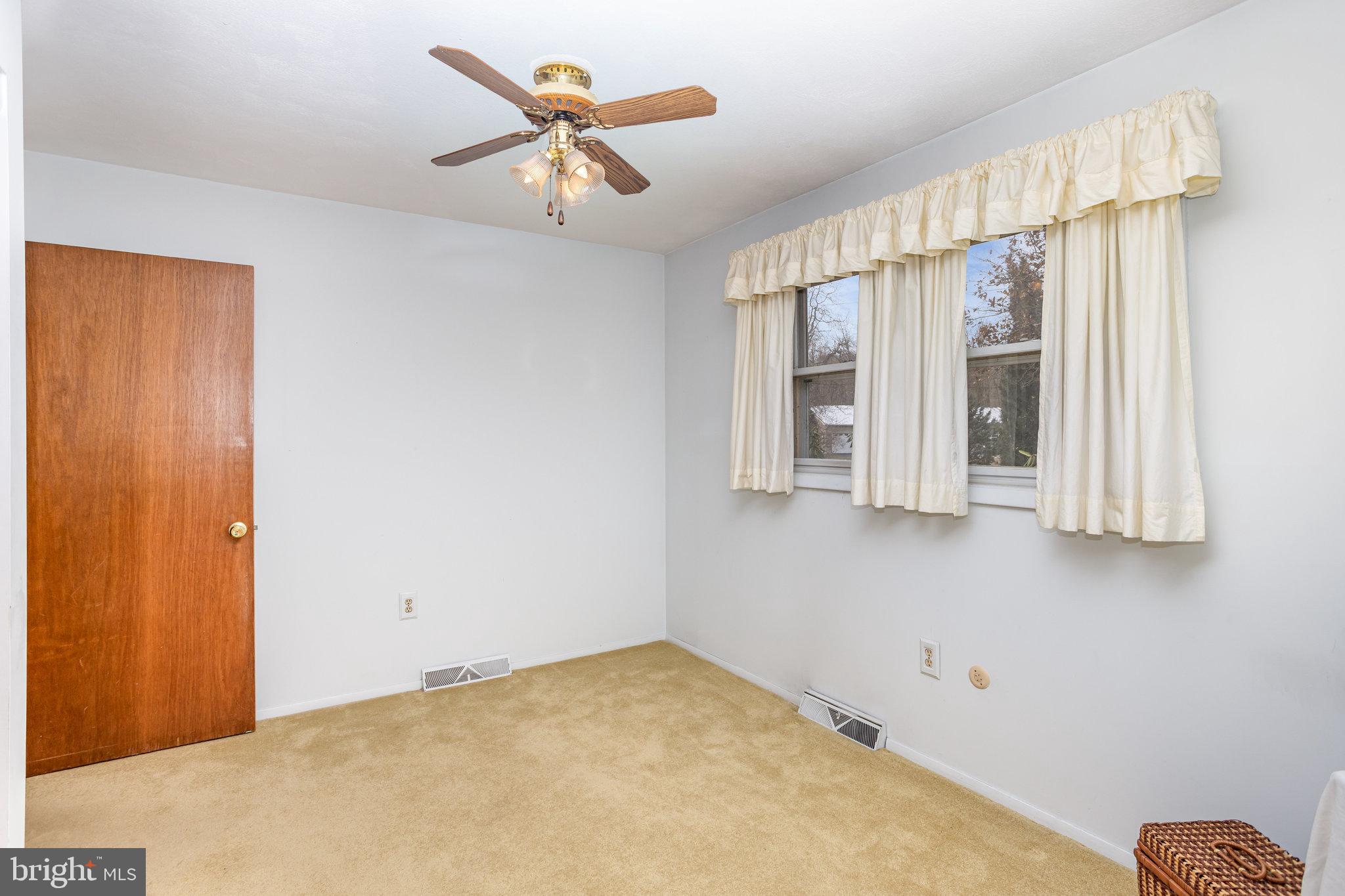 32 Bishop Road Mechanicsburg, PA 17055 - Photo 12 of 31 a view of an empty room with a window