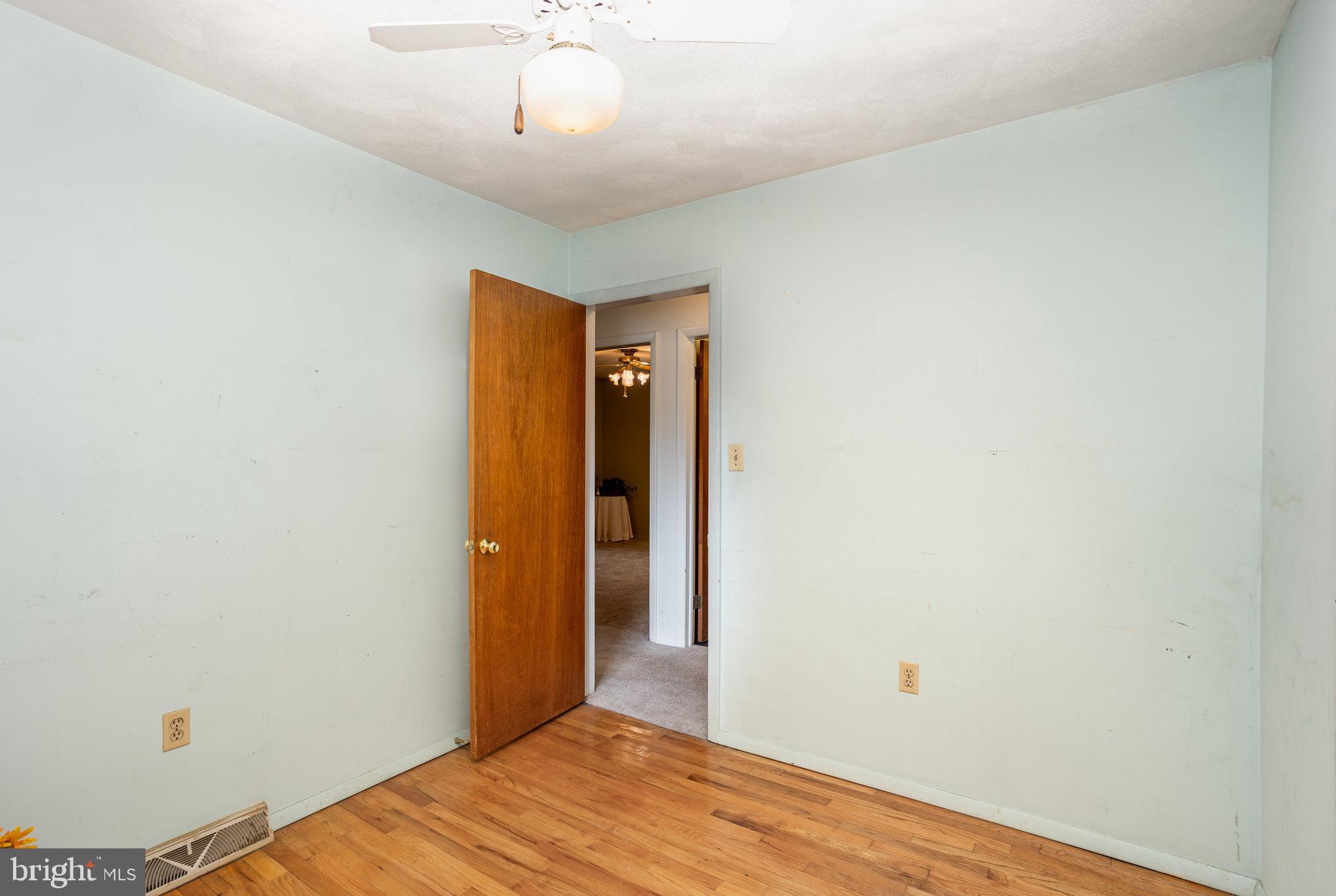 32 Bishop Road Mechanicsburg, PA 17055 - Photo 15 of 31 a view of a room with wooden floor