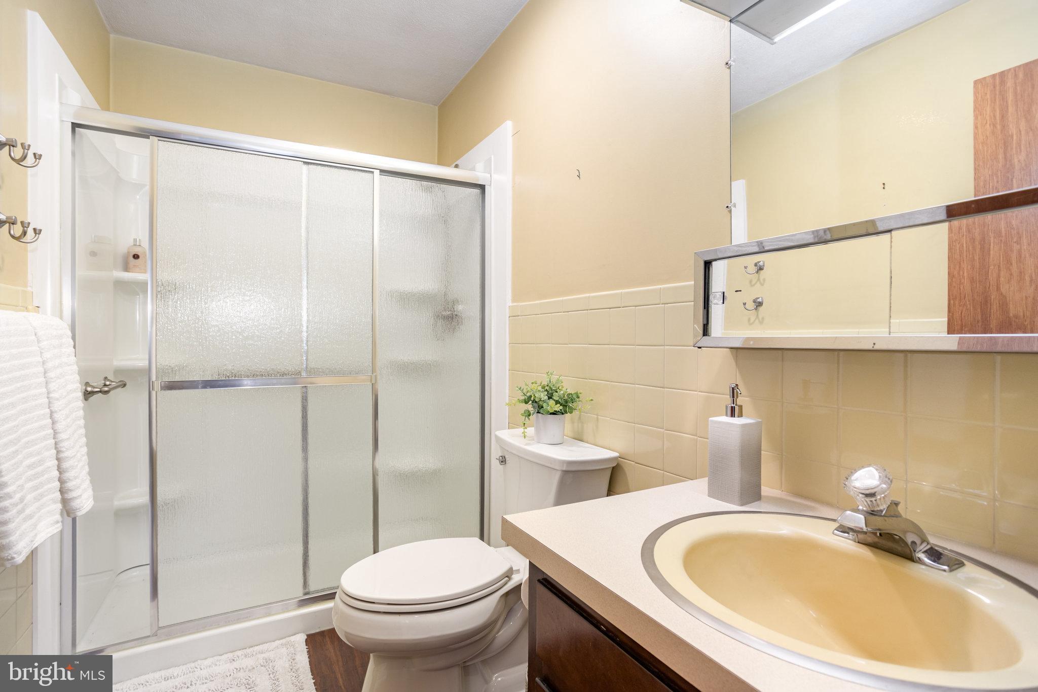 32 Bishop Road Mechanicsburg, PA 17055 - Photo 16 of 31 a bathroom with a sink toilet and shower