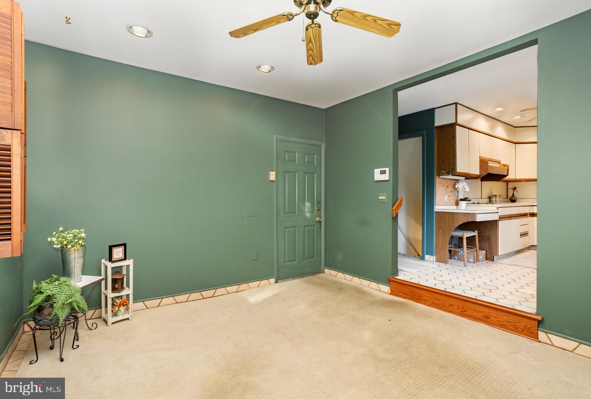 32 Bishop Road Mechanicsburg, PA 17055 - Photo 2 of 31 a bedroom with a bed and a chandelier