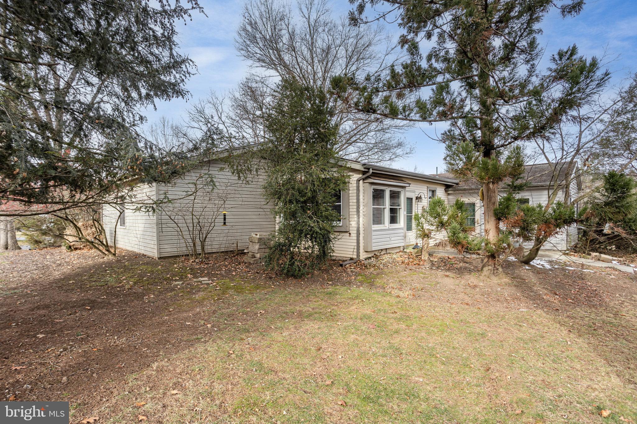 32 Bishop Road Mechanicsburg, PA 17055 - Photo 29 of 31 a house with a tree in front of it