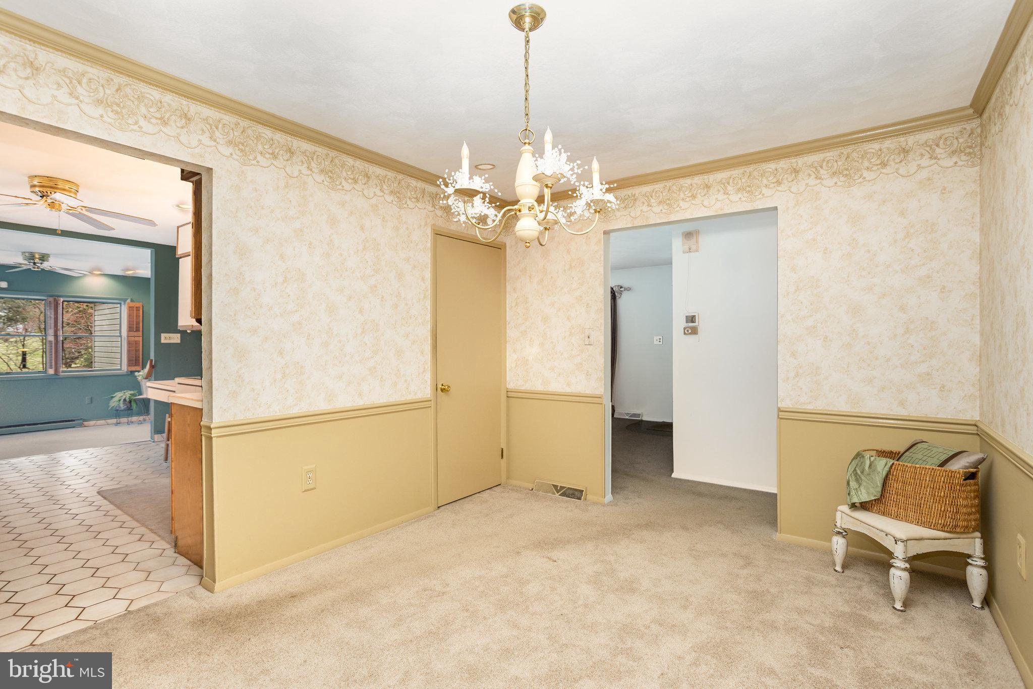 32 Bishop Road Mechanicsburg, PA 17055 - Photo 6 of 31 a view of a room with furniture and a chandelier